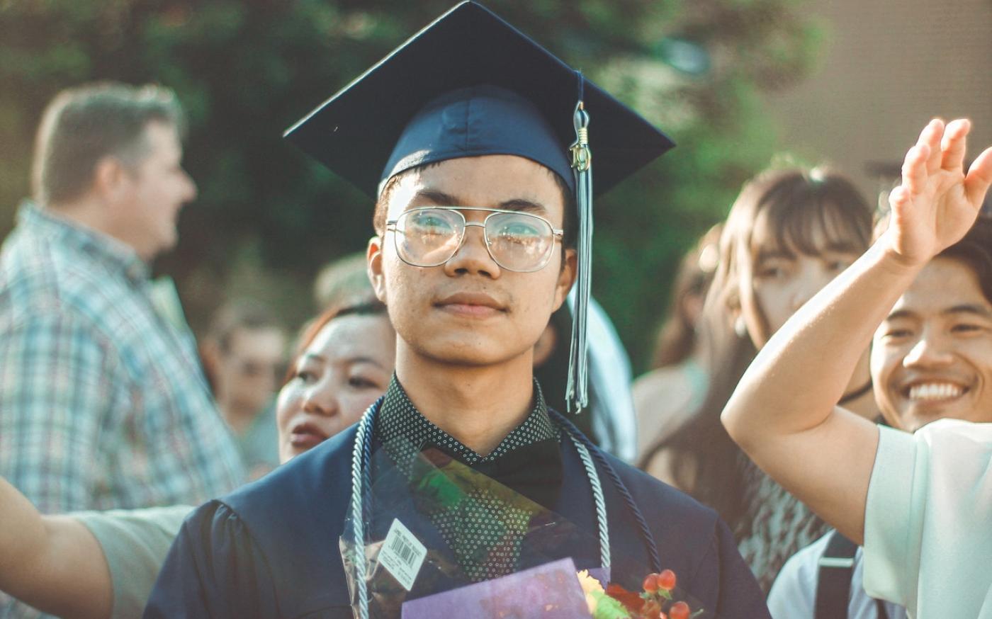 Man in a graduation cap and gown